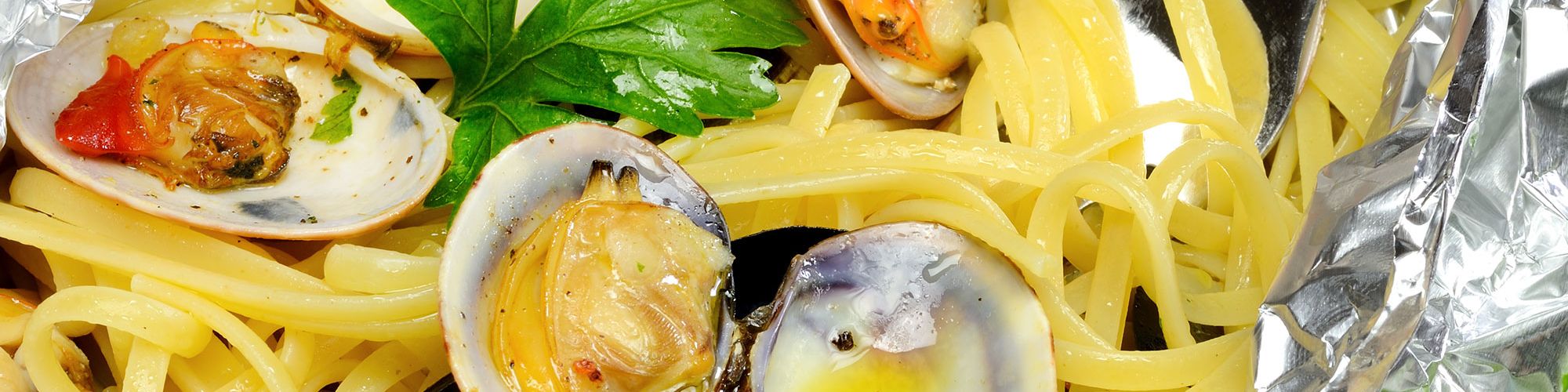 ricetta Tagliolini al cartoccio con cozze e vongole con pasta fresca