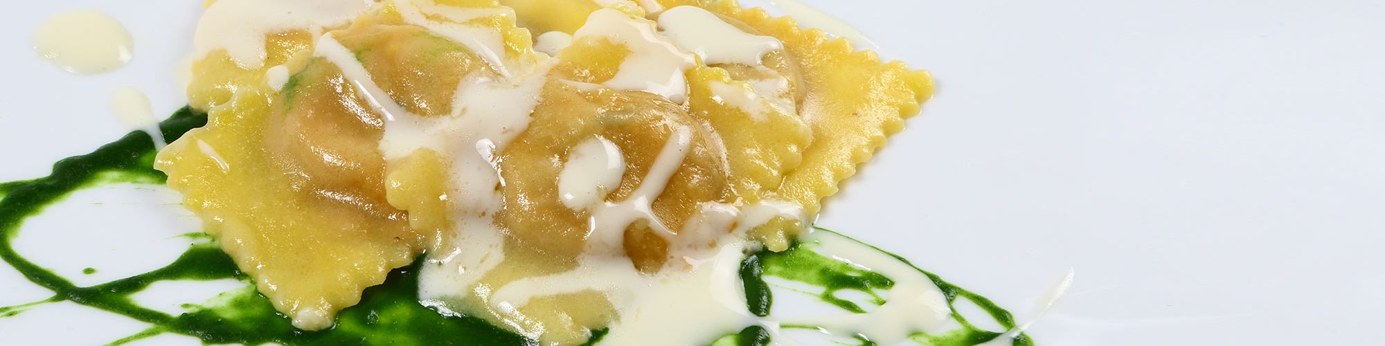 ricetta Ravioloni con crema di topinambur e pesto con pasta fresca