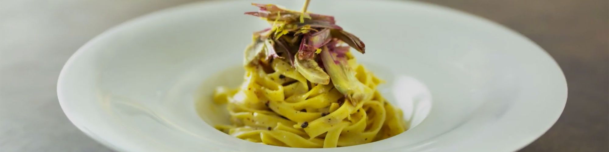 ricetta Tagliatelle ai 3 pepi e cacio con carciofi e limone con pasta fresca