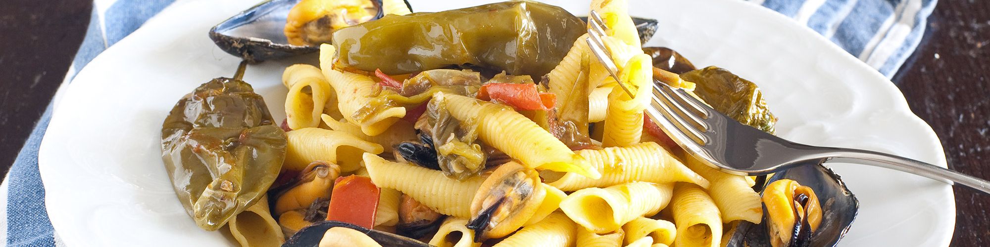 ricetta Garganelli con cozze e friggitelli con pasta fresca